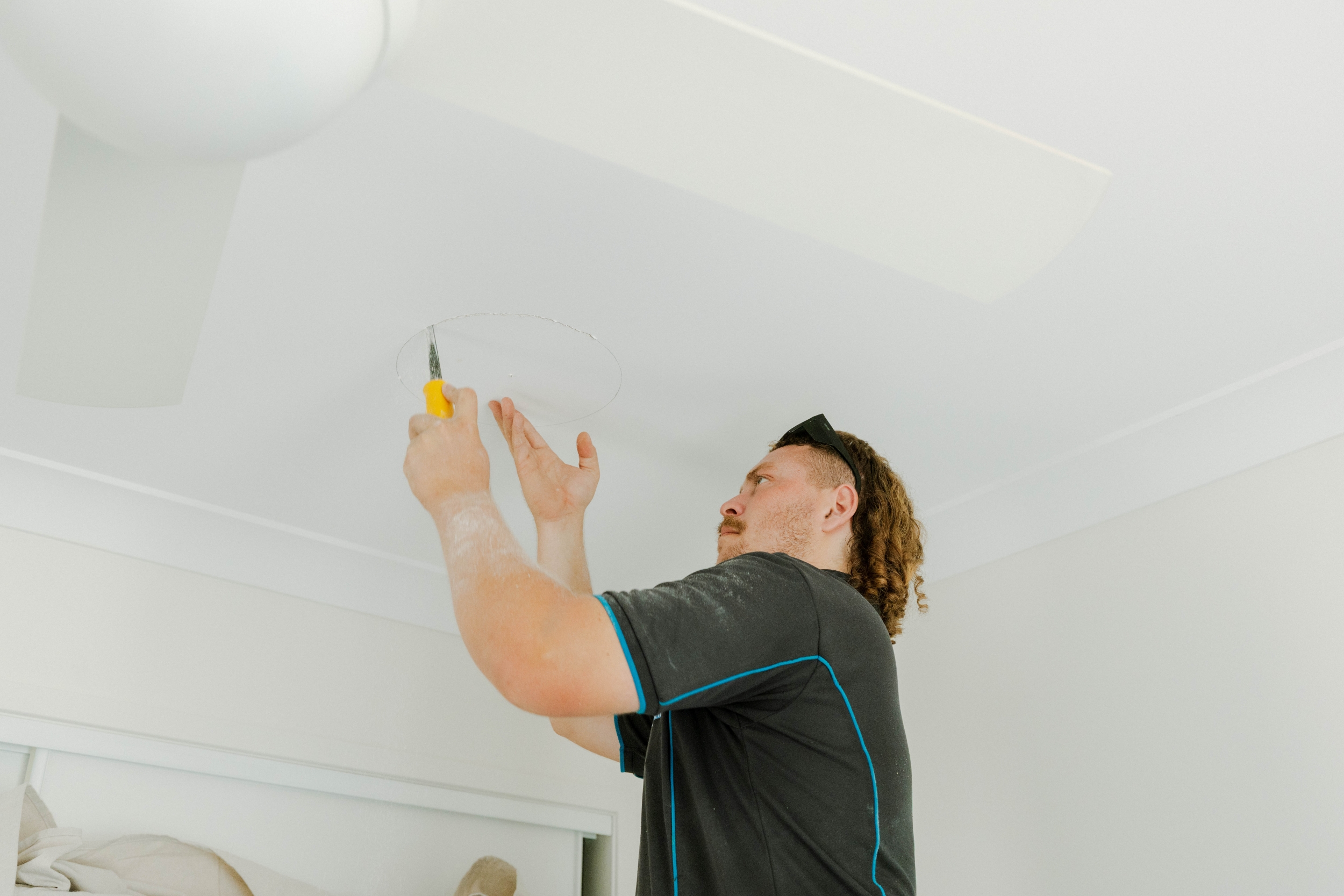Precision cutting a ceiling vent hole for ducted air conditioning installation
