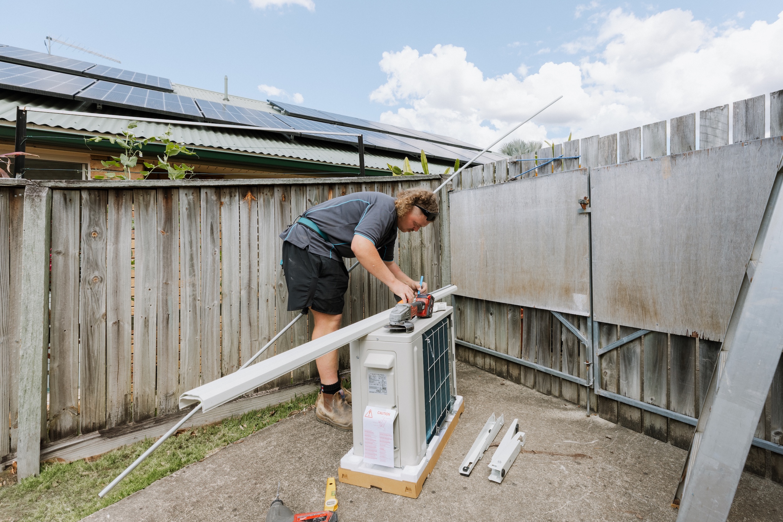 Professional outdoor aircon compressor pipe preparation