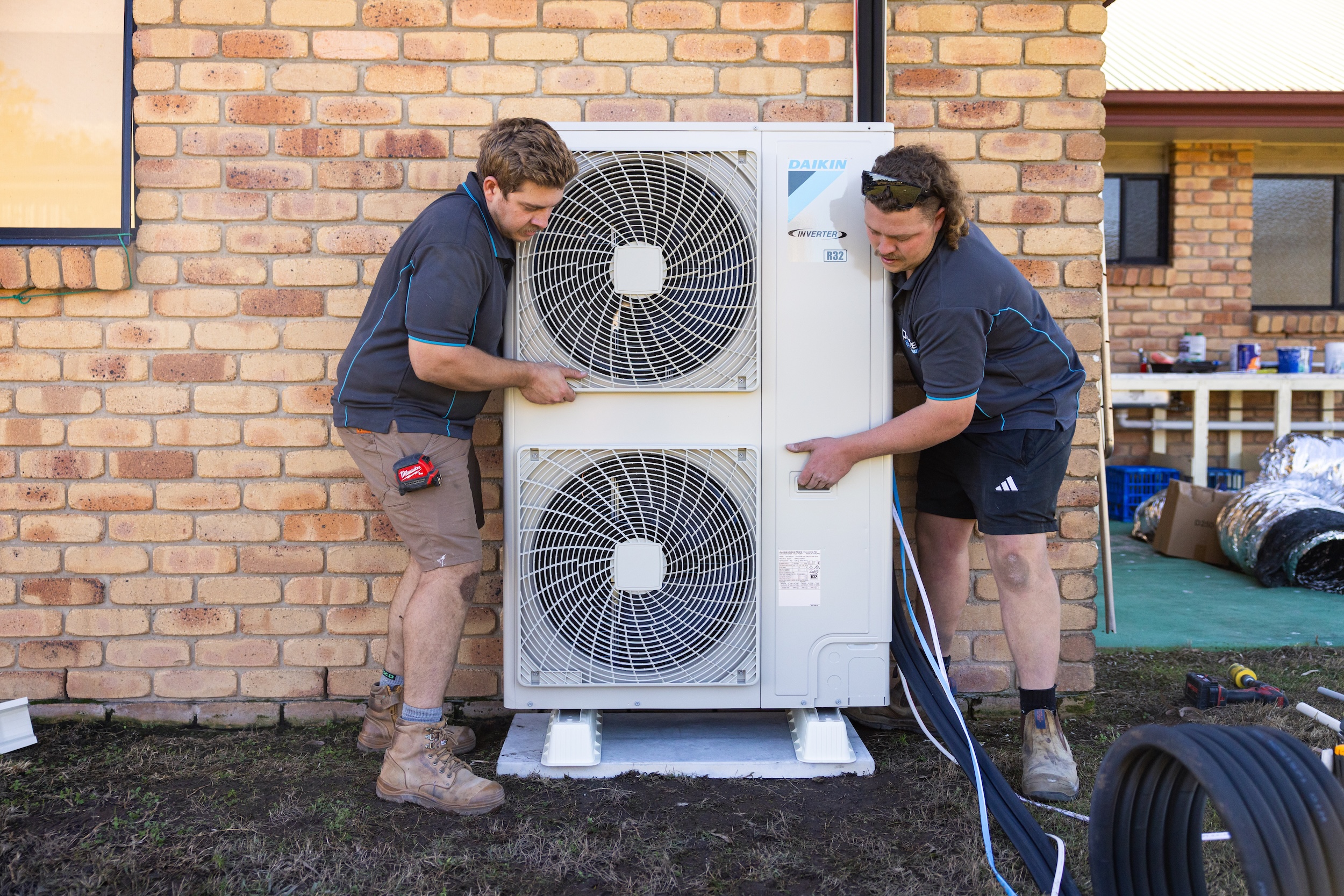 Parker Air Solutions team installing ducted air conditioning at Woodhill